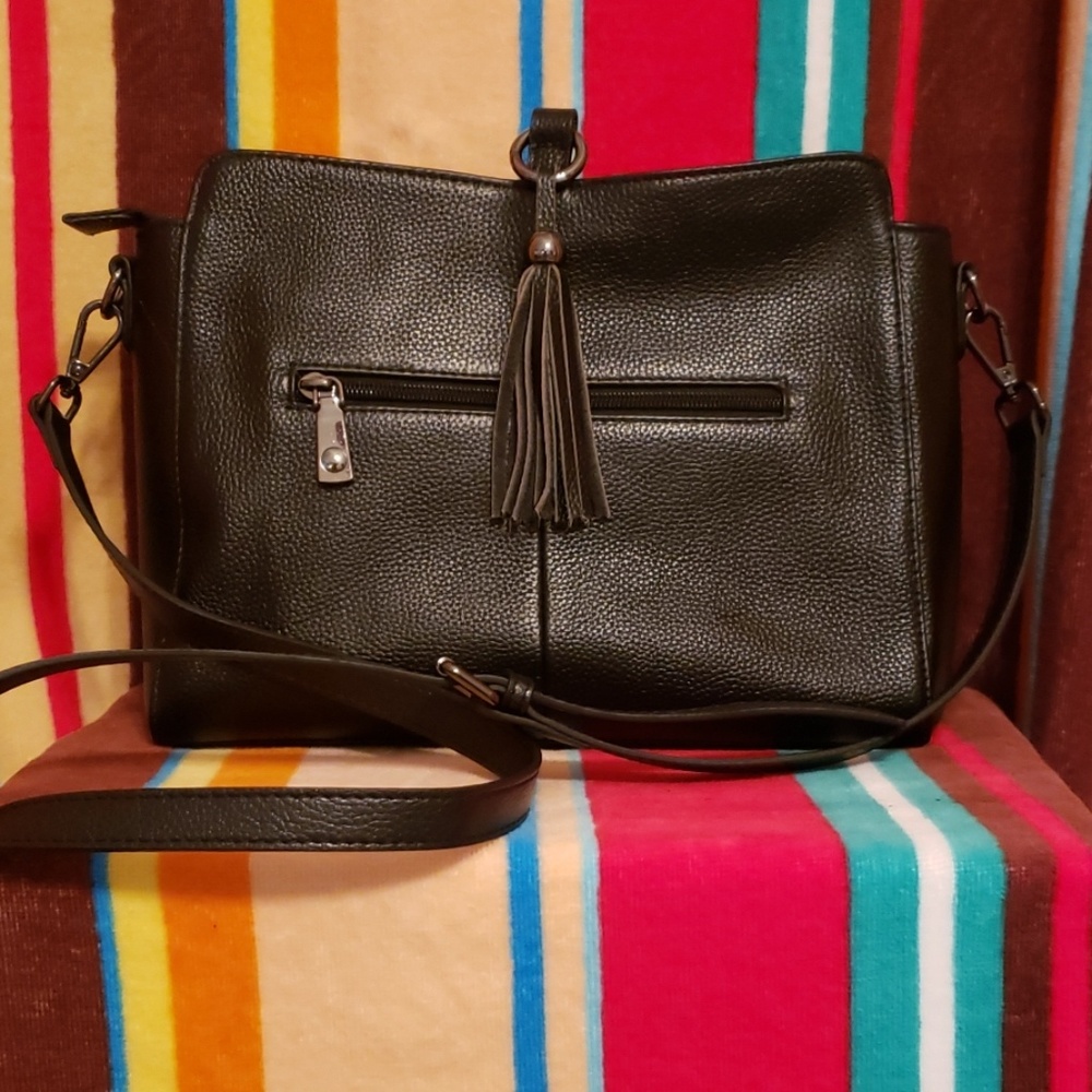Shoulder / cross body bag with adjustable strap.